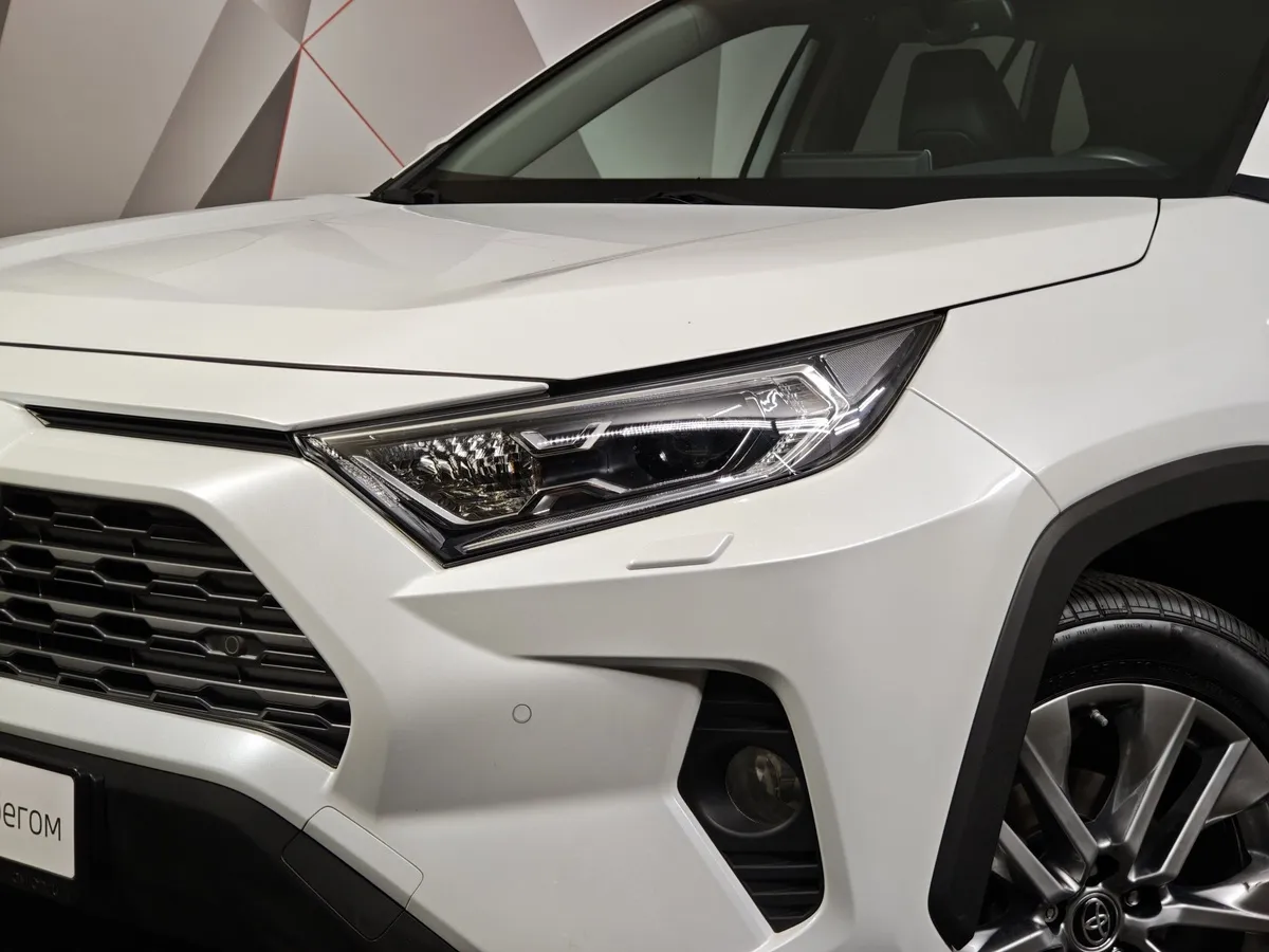 Toyota RAV4 2.5i AT AWD (199 л.с.) Комфорт Белый в АВИЛОН. Слайд №10