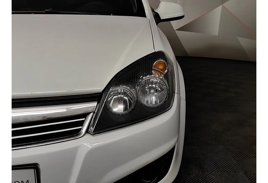 Opel Astra 1.8 AT (140 л.с.) base Белый в АВИЛОН. Слайд №10