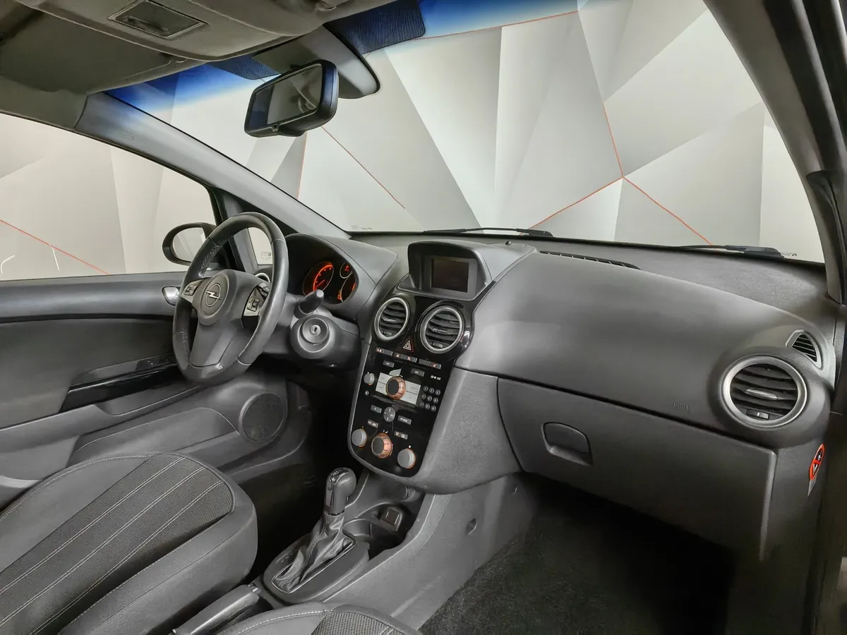 Opel Corsa 1.4 AT (101 л.с.) Черный в АВИЛОН. Слайд №12