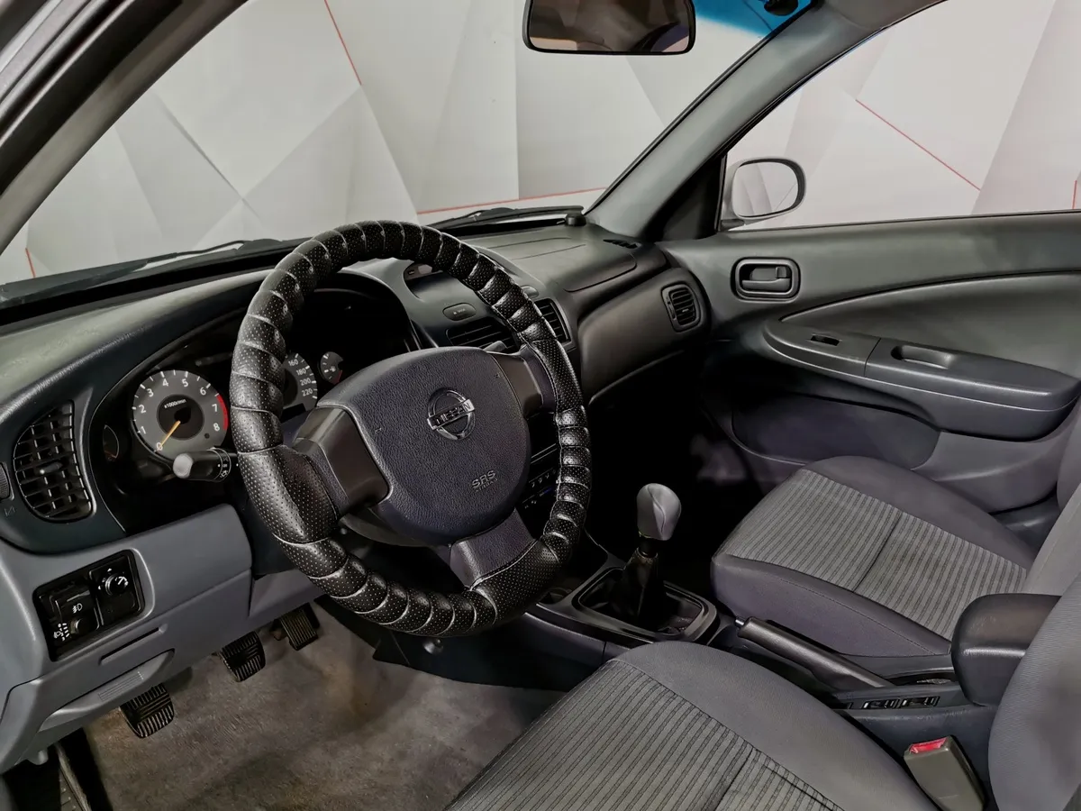 Nissan Almera Classic 1.6 MT (107 л.с.) Серебристый в АВИЛОН. Слайд №18