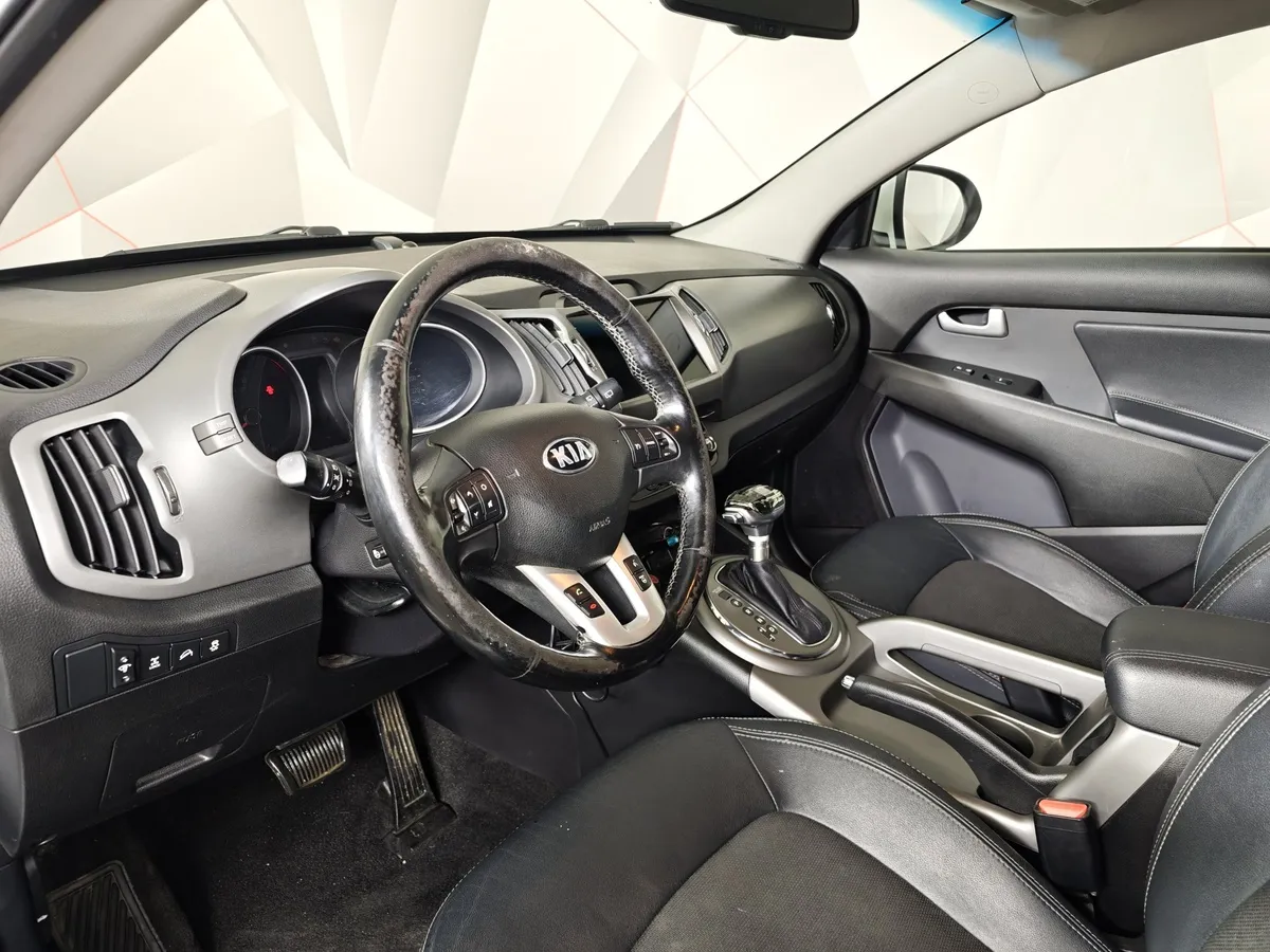 Kia Sportage 2.0 AT 4WD (150 л.с.) Luxe Белый в АВИЛОН. Слайд №19