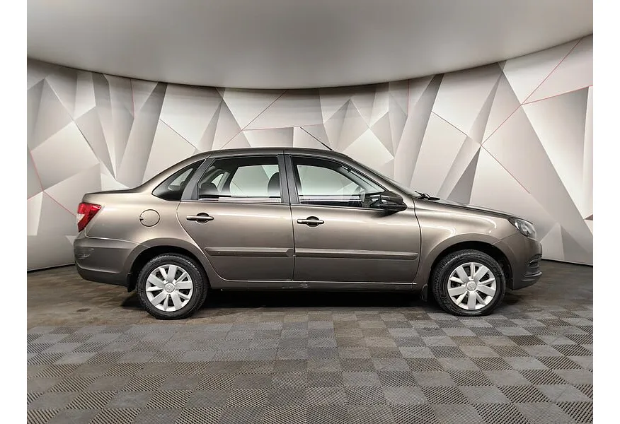 ВАЗ (Lada) Granta 1.6 AT 16кл (98 л.с.) Коричневый в АВИЛОН. Слайд №4