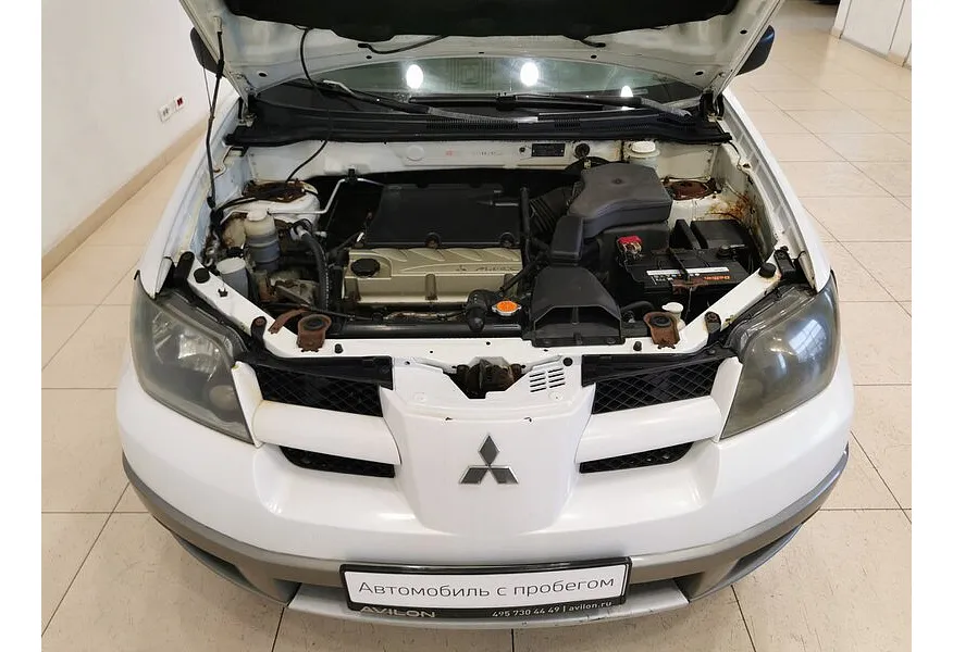 Mitsubishi Outlander 2.4 AT 4WD (160 л.с.) Белый в АВИЛОН. Слайд №10