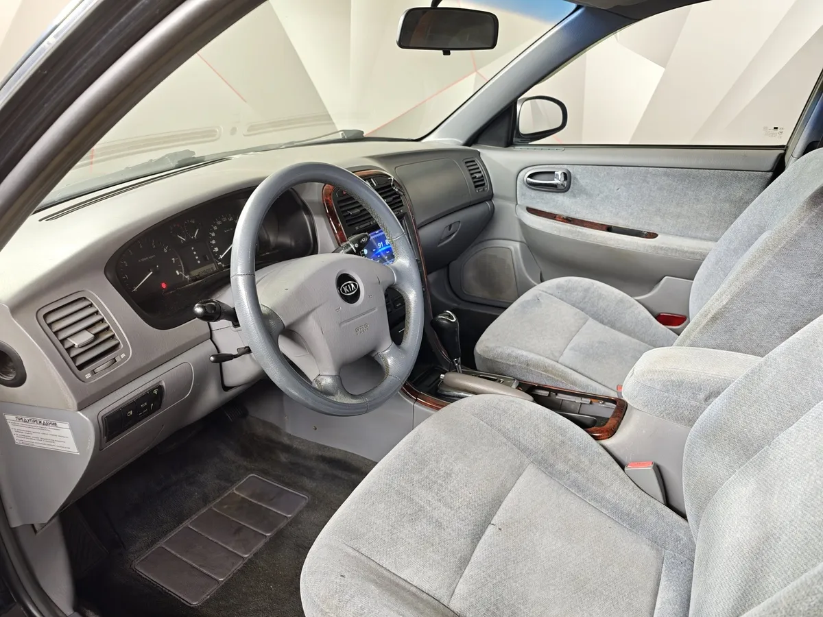 Kia Magentis 2.5 AT (166 л.с.) Черный в АВИЛОН. Слайд №17