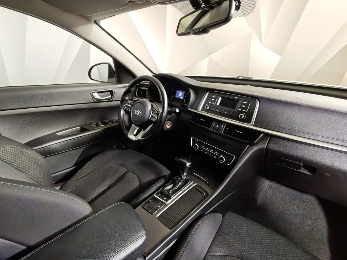 Kia Optima 2.0 AT (150 л.с.) Classic Белый в АВИЛОН. Слайд №13