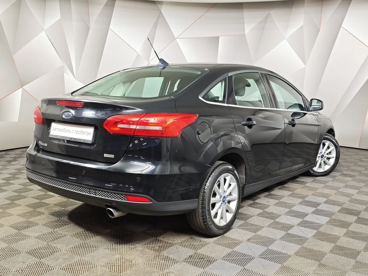 Ford Focus 1.5 EcoBoost AT (150 л.с.) Titanium Черный в АВИЛОН. Слайд №2