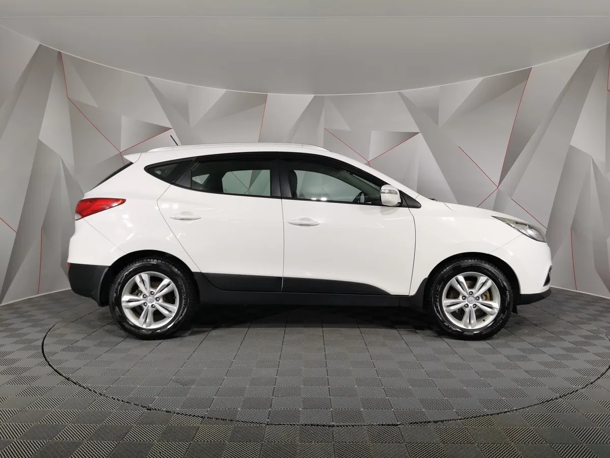 Hyundai ix35 2.0 AT 4WD (150 л.с.) Comfort + Navi Белый в АВИЛОН. Слайд №6