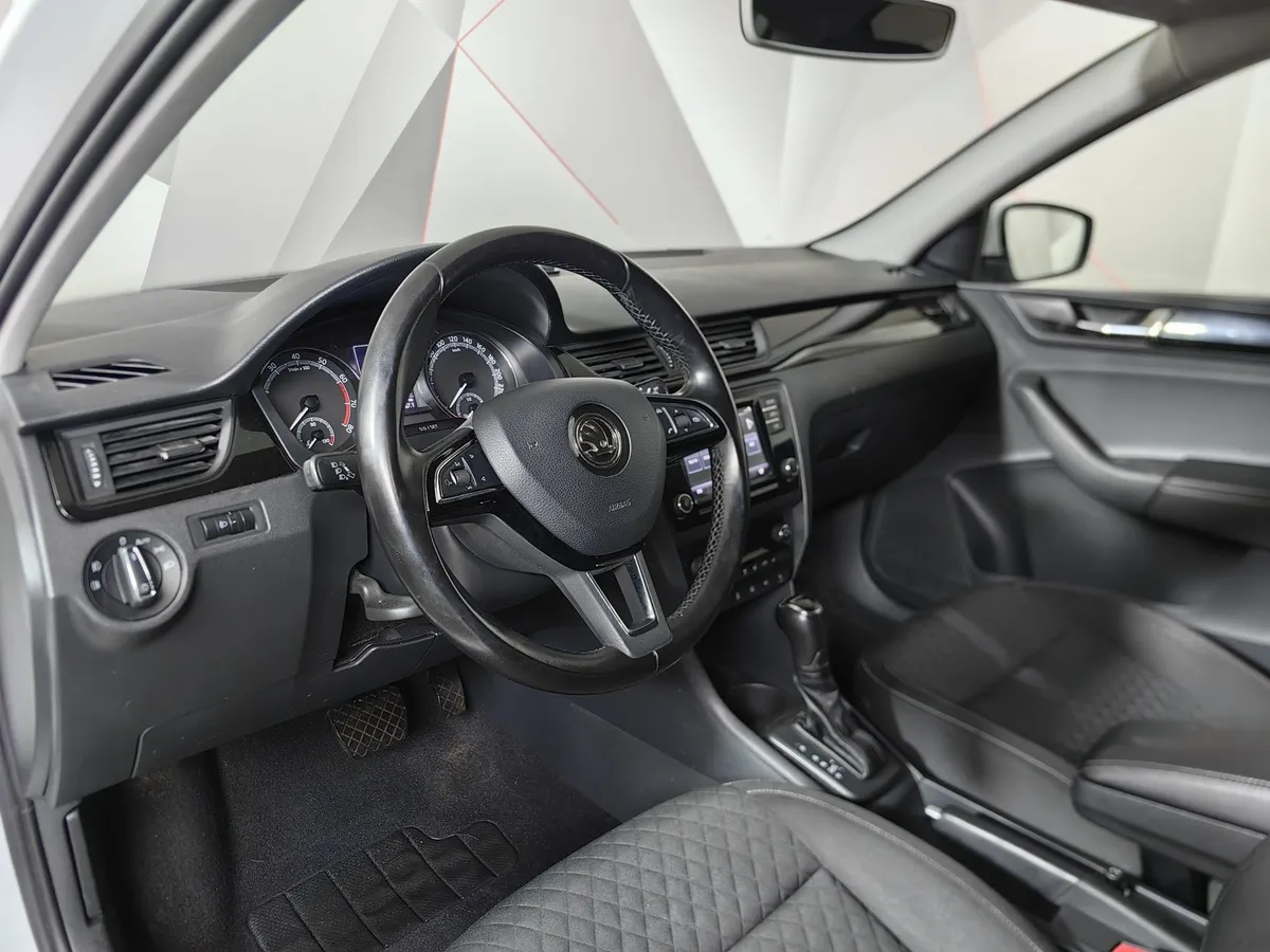 Skoda Rapid 1.6 AT (110 л.с.) Белый в АВИЛОН. Слайд №19