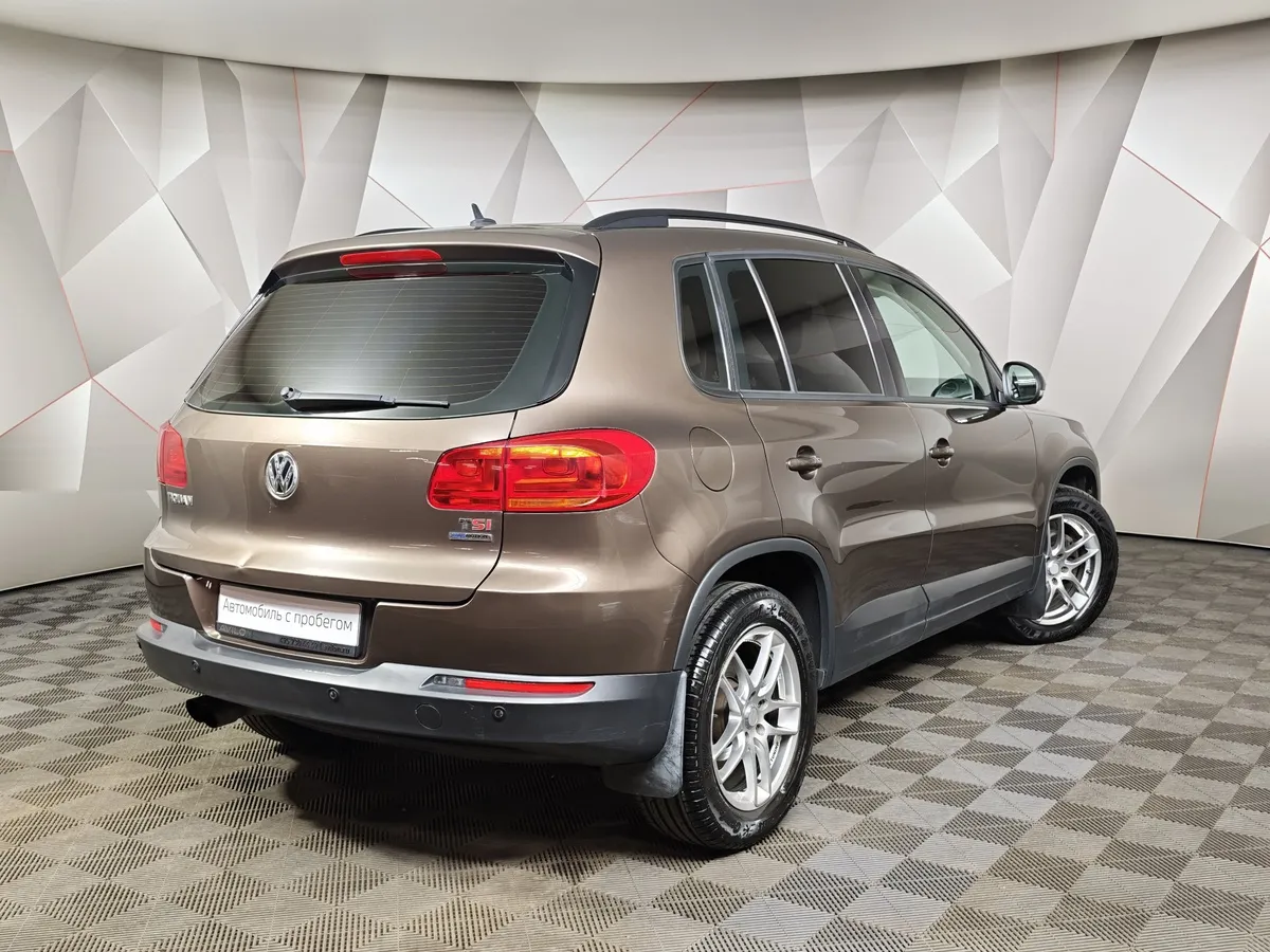 Volkswagen Tiguan 1.4 TSI BlueMotion DSG (150 л.с.) Коричневый в АВИЛОН. Слайд №2