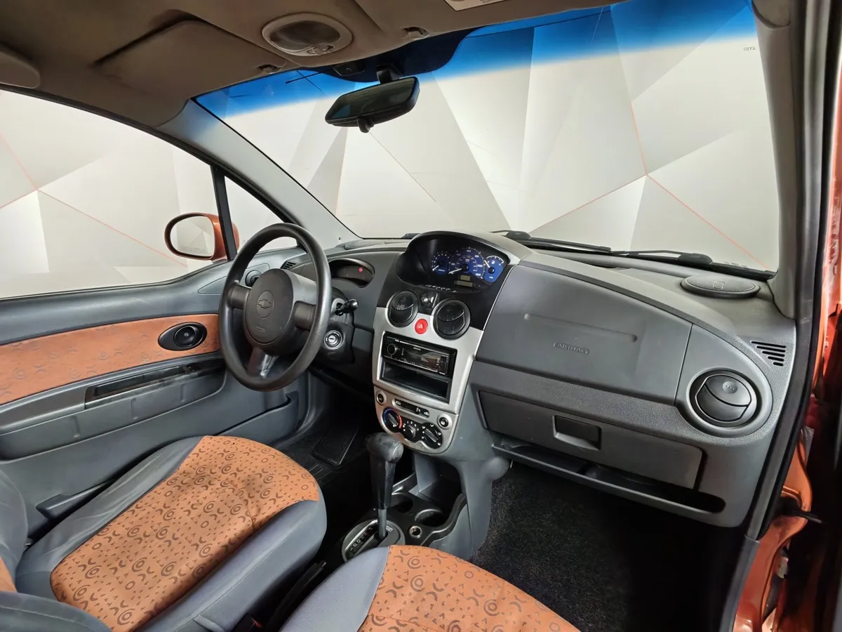 Chevrolet Spark 0.8 AT FWD (52 л.с.) Оранжевый в АВИЛОН. Слайд №9