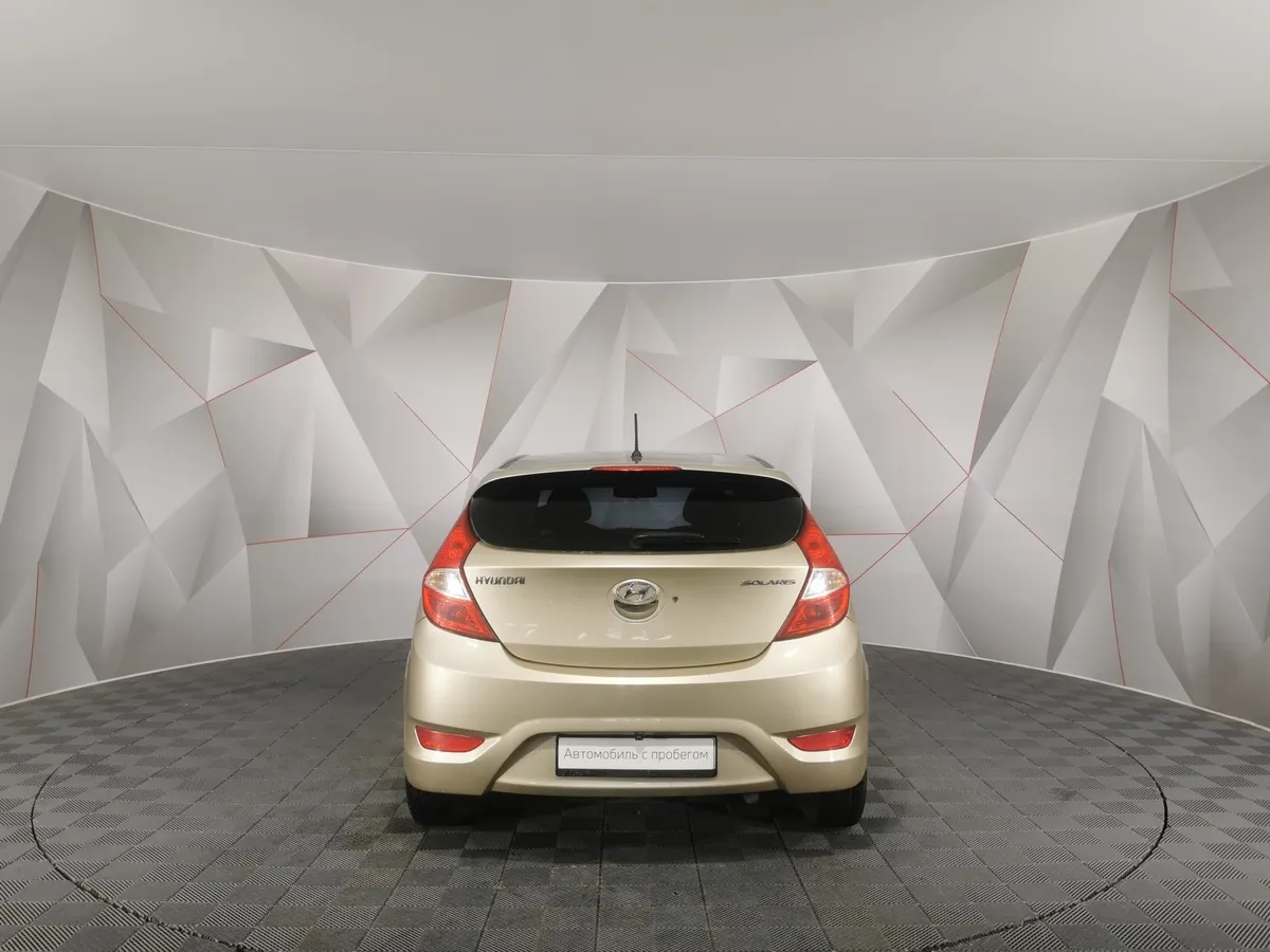 Hyundai Solaris 1.4 AT (107 л.с.) Active Бежевый в АВИЛОН. Слайд №8