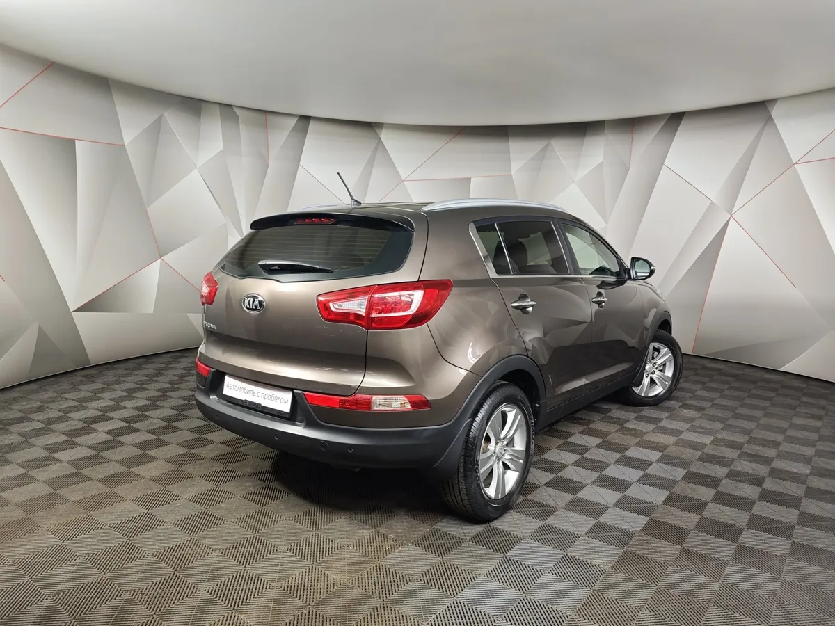 Kia Sportage 2.0 AT (150 л.с.) Коричневый в АВИЛОН. Слайд №2