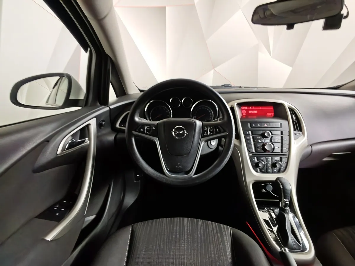 Opel Astra 1.6 AT (115 л.с.) Белый в АВИЛОН. Слайд №17