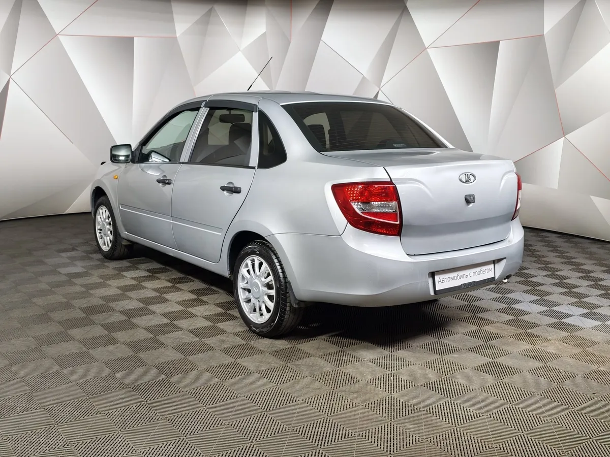 ВАЗ (Lada) Granta 1.6 MT 16кл (98 л.с.) Серебристый в АВИЛОН. Слайд №4