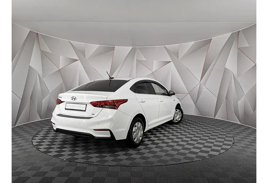 Hyundai Solaris 1.6 MT (123 л.с.) Family Белый в АВИЛОН. Слайд №2