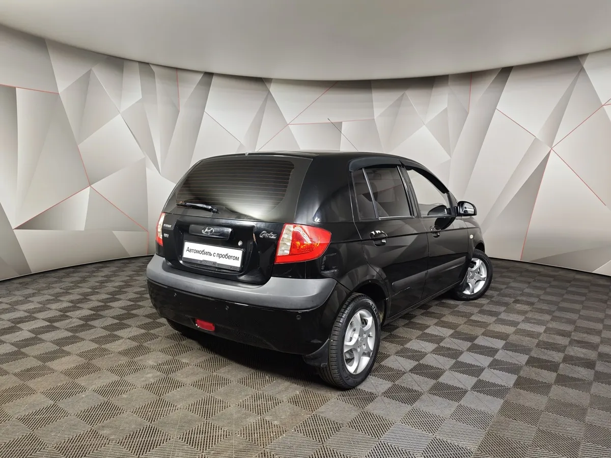 Hyundai Getz 1.4 AT (97 л.с.) Черный в АВИЛОН. Слайд №2