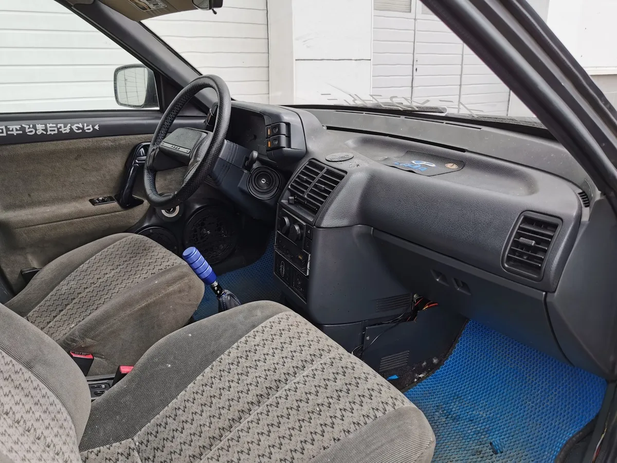 ВАЗ (Lada) 2112 21124 MT (89 л.с.) Черный в АВИЛОН. Слайд №11