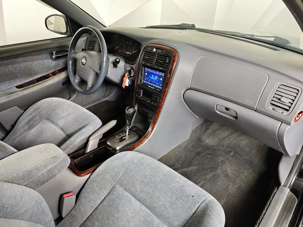 Kia Magentis 2.5 AT (166 л.с.) Черный в АВИЛОН. Слайд №11