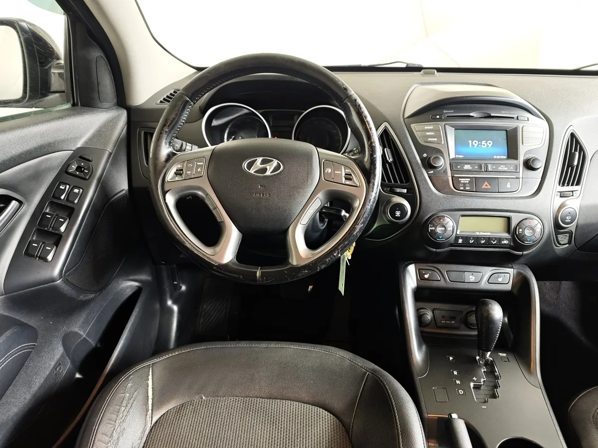Hyundai ix35 2.0 AT 4WD (150 л.с.) Comfort Черный в АВИЛОН. Слайд №20