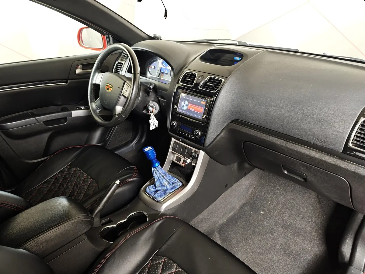Geely Emgrand 7 1.8 MT (129 л.с.) Красный в АВИЛОН. Слайд №12
