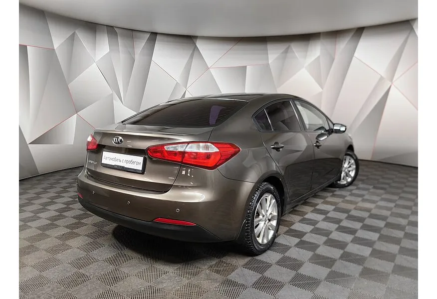 Kia Cerato 1.6 AT (130 л.с.) Бежевый в АВИЛОН. Слайд №2