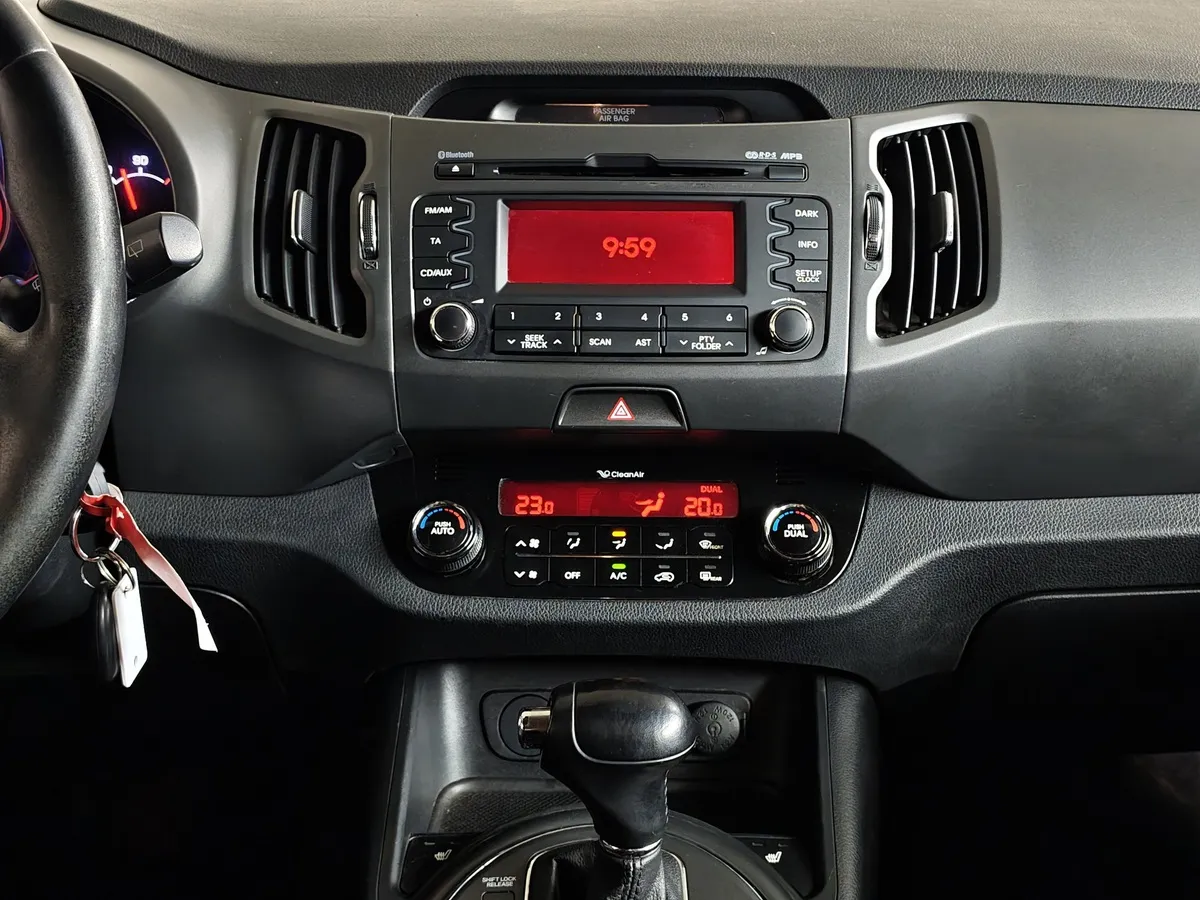Kia Sportage 2.0 AT 4WD (150 л.с.) Luxe Коричневый в АВИЛОН. Слайд №20
