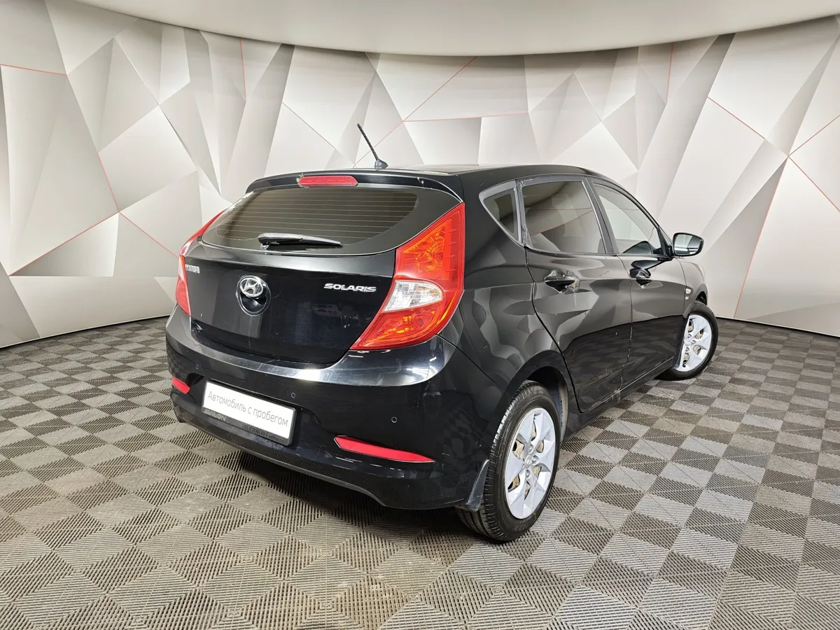Hyundai Solaris 1.6 AT (123 л.с.) Comfort Черный в АВИЛОН. Слайд №2