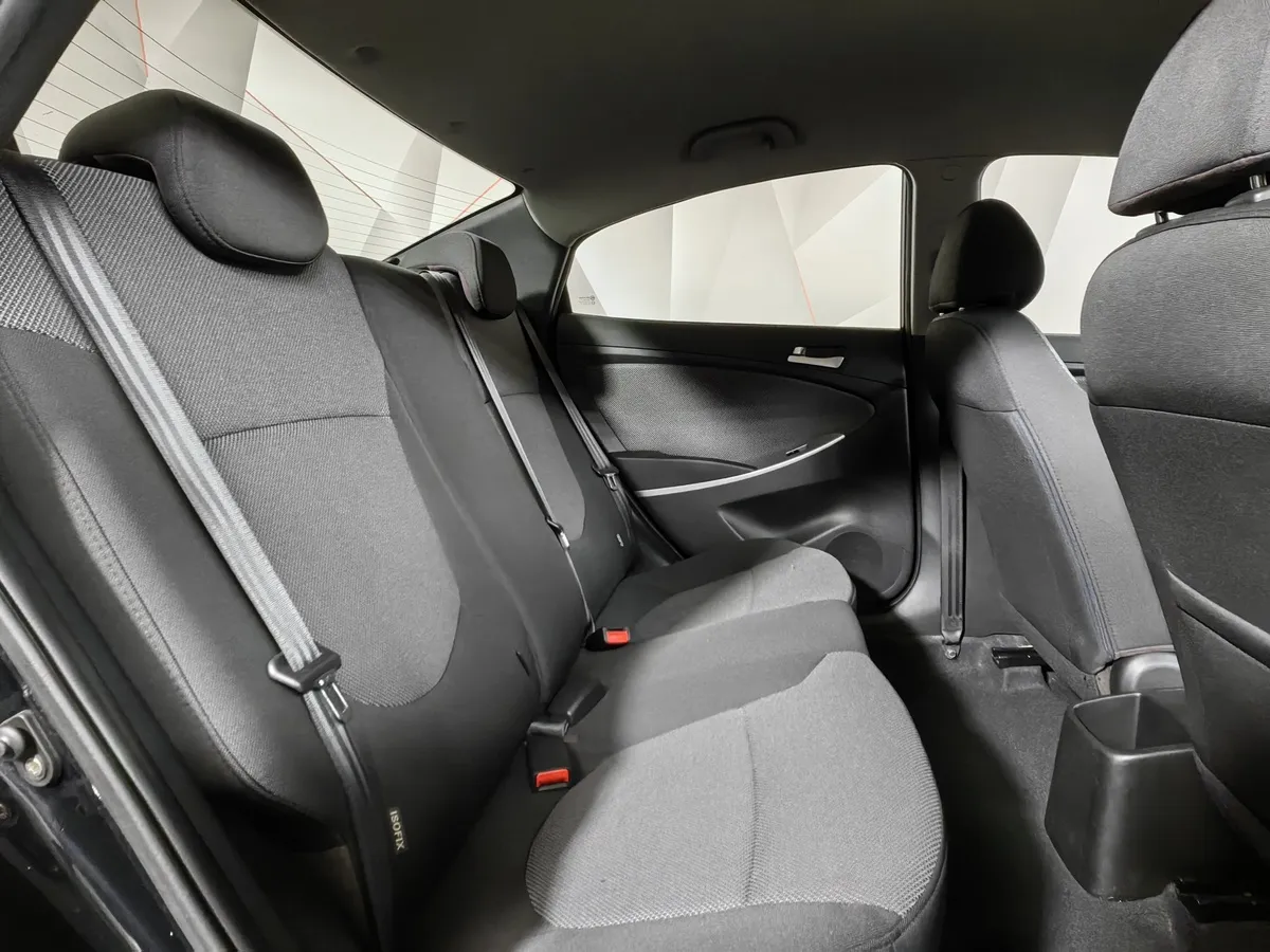 Hyundai Solaris 1.6 MT (123 л.с.) Optima Черный в АВИЛОН. Слайд №16