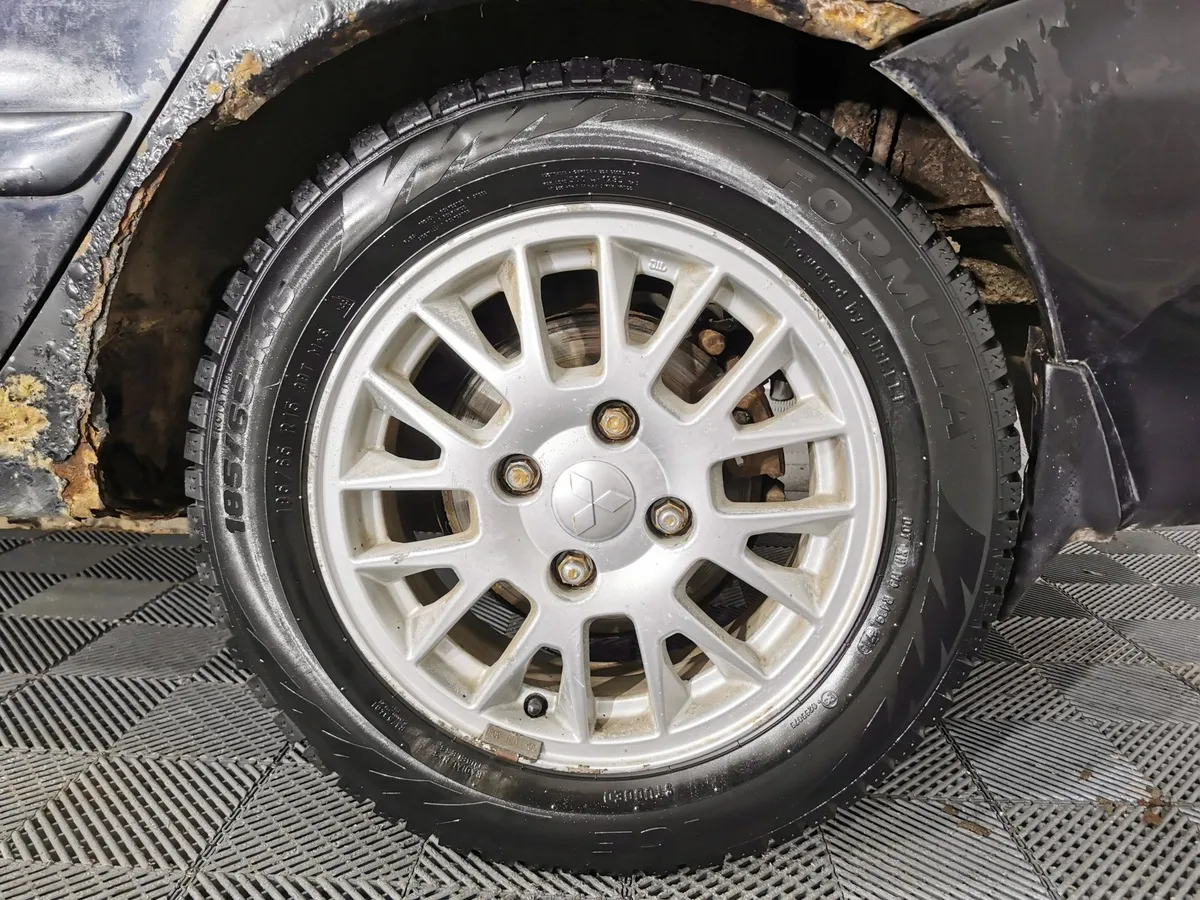 Mitsubishi Lancer 1.3 MT (82 л.с.) Черный в АВИЛОН. Слайд №9