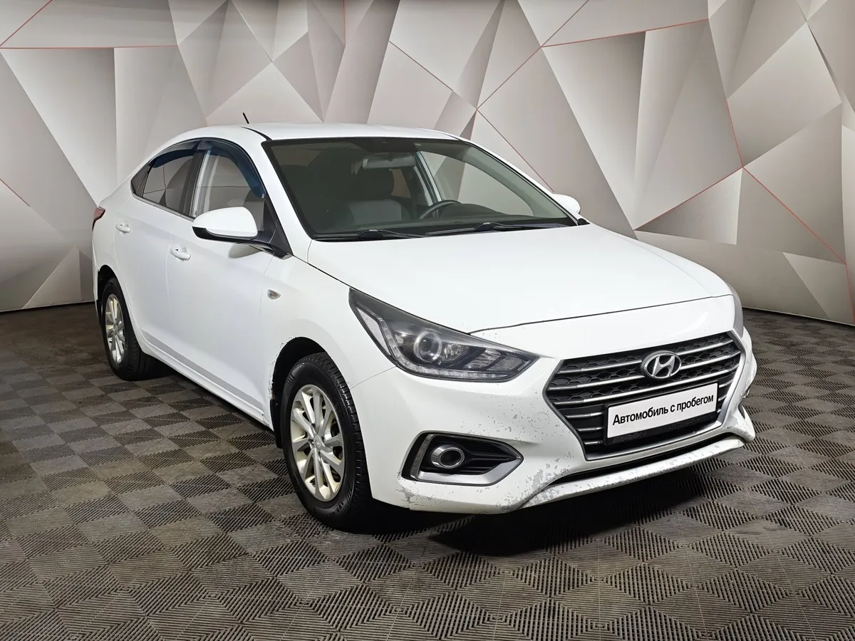 Hyundai Solaris 1.6 MT (123 л.с.) Elegance Белый в АВИЛОН. Слайд №3