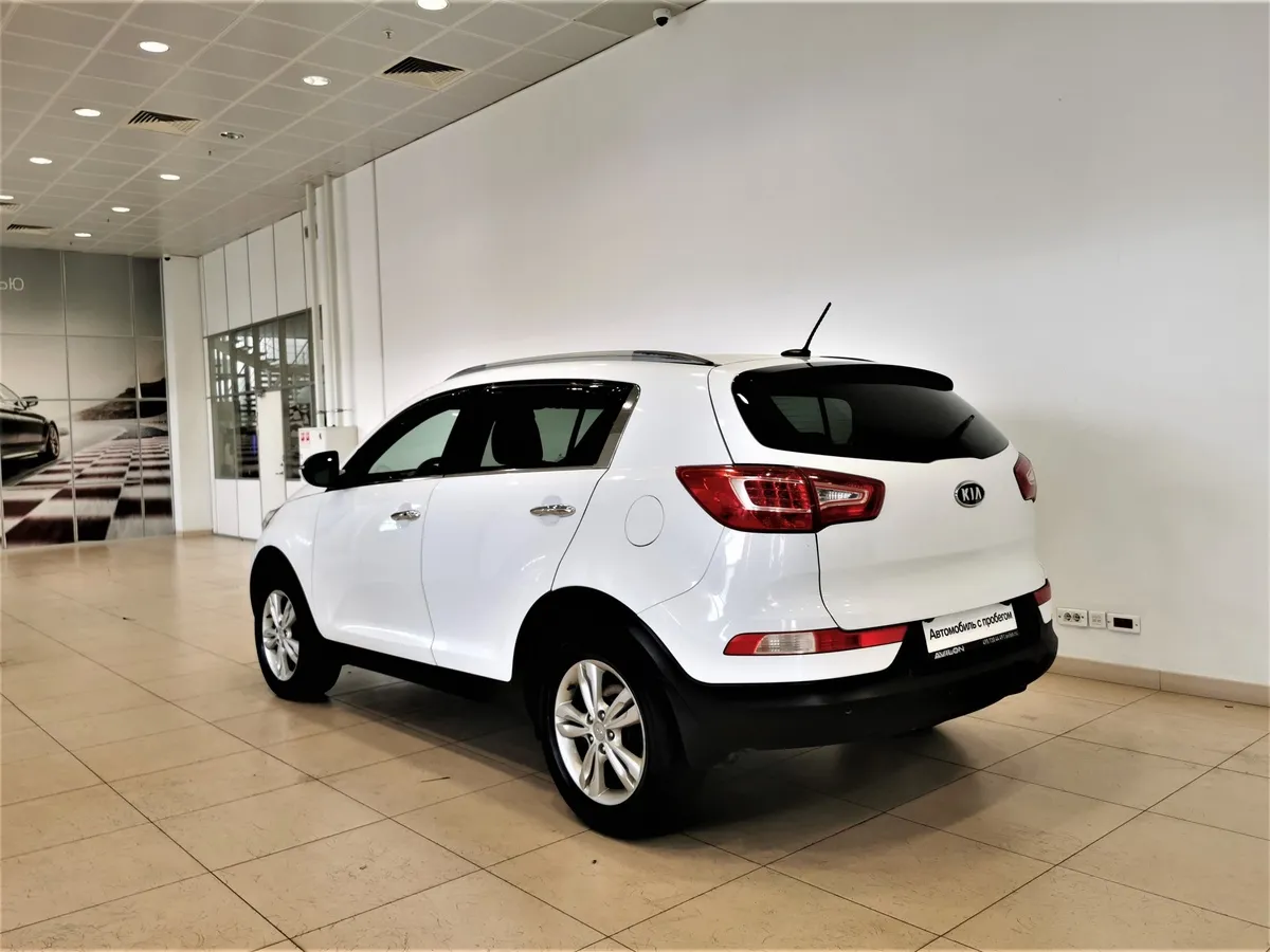 Kia Sportage 2.0 TD AT 4WD (136 л.с.) Белый в АВИЛОН. Слайд №4
