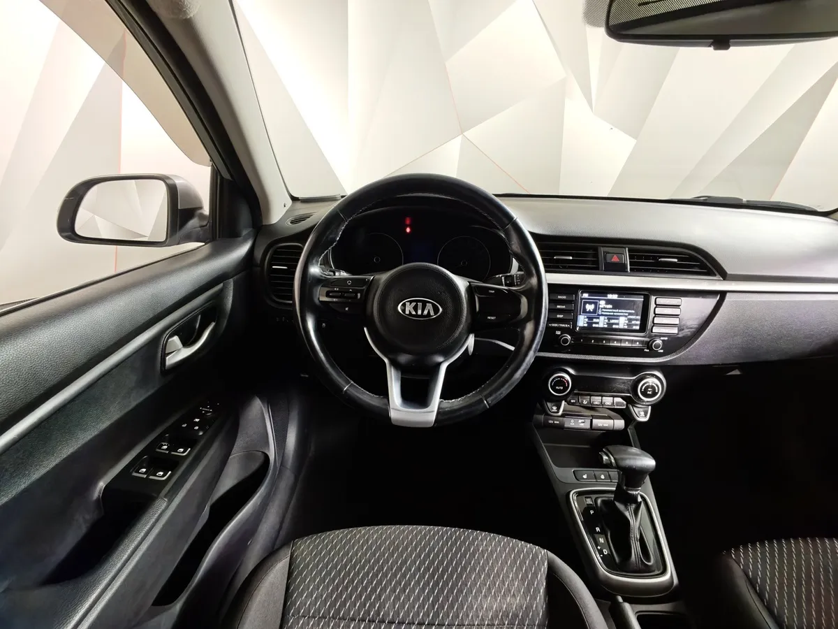 Kia Rio 1.6 AT (123 л.с.) Серебристый в АВИЛОН. Слайд №19