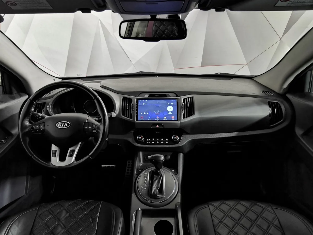 Kia Sportage 2.0 AT 4WD (150 л.с.) Luxe Коричневый в АВИЛОН. Слайд №12