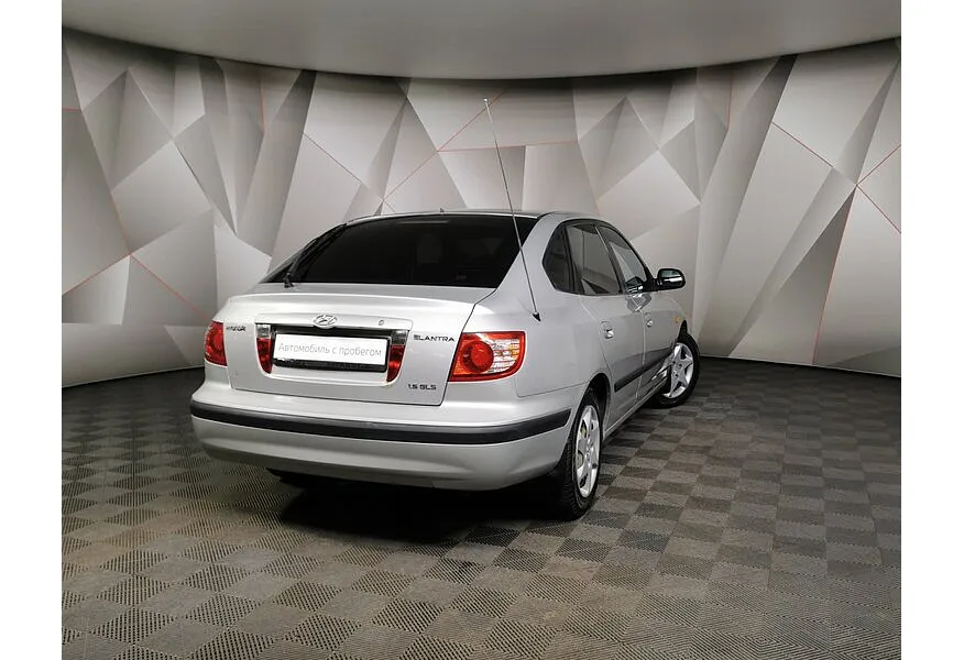 Hyundai Elantra 1.6 MT (105 л.с.) Серебристый в АВИЛОН. Слайд №2