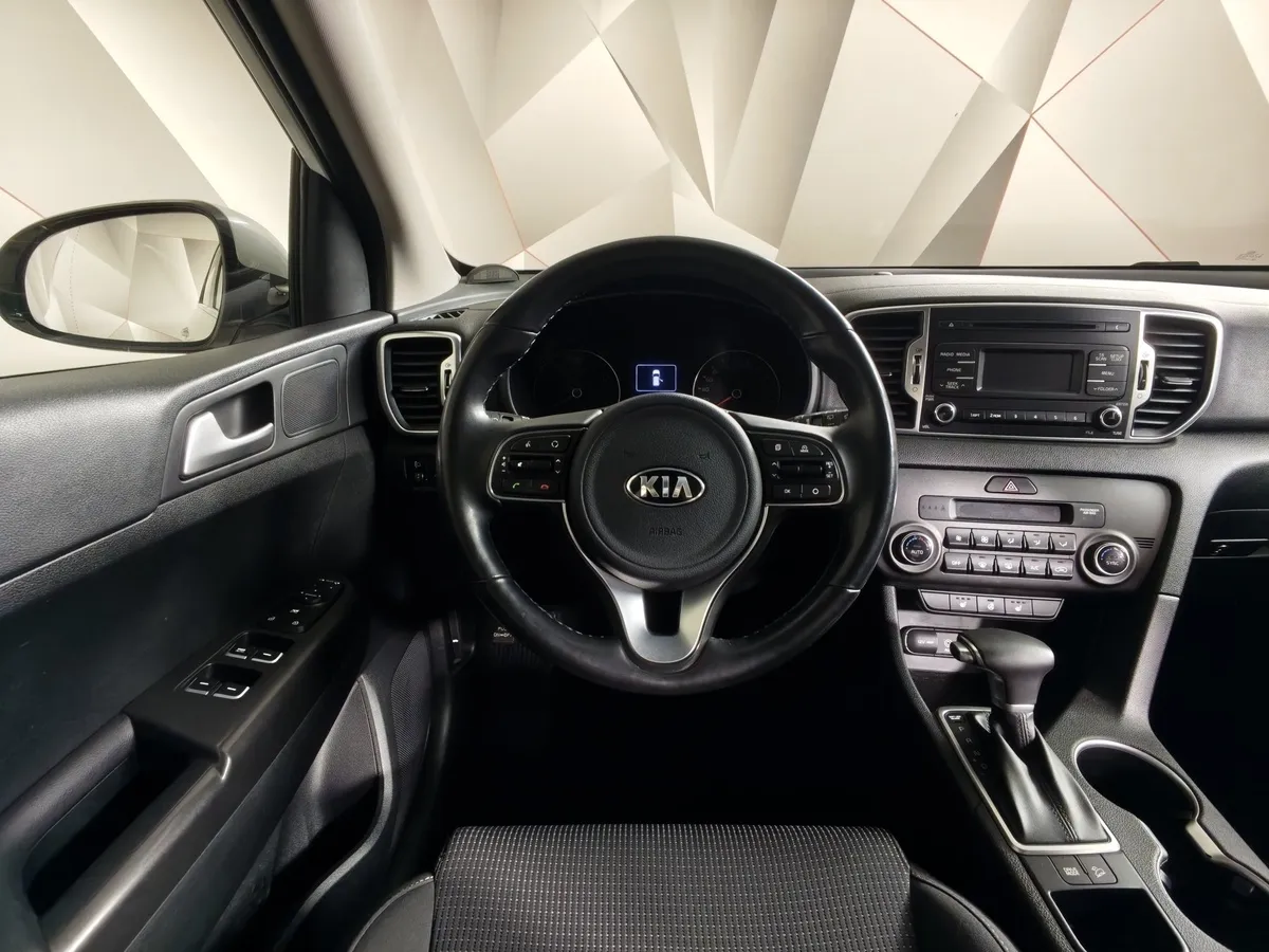 Kia Sportage 2.0 AT (150 л.с.) Comfort Белый в АВИЛОН. Слайд №20