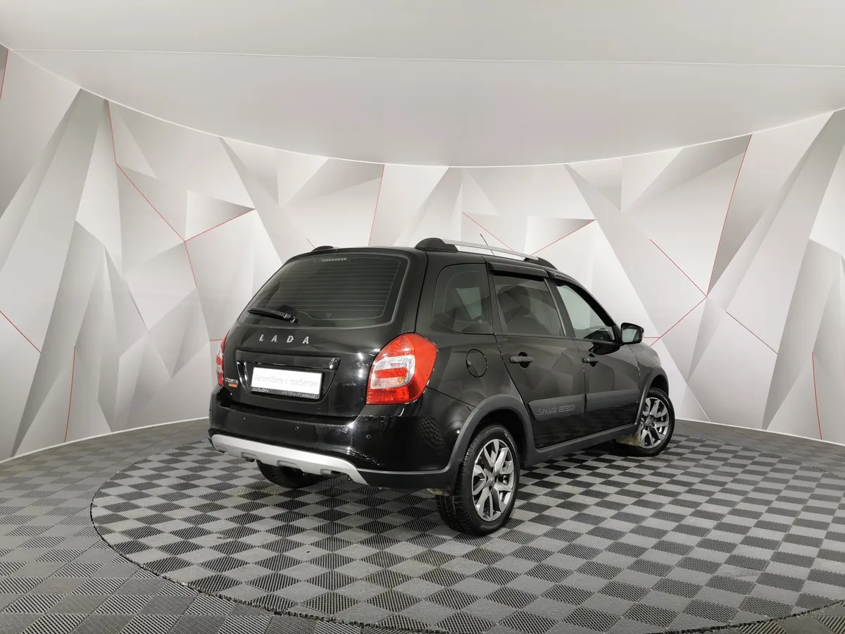 ВАЗ (Lada) Granta 1.6 MT (106 л.с.) Черный в АВИЛОН. Слайд №2