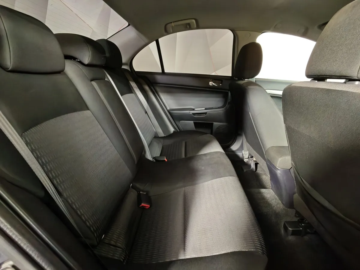 Mitsubishi Lancer 1.6 AT (117 л.с.) Серый в АВИЛОН. Слайд №16