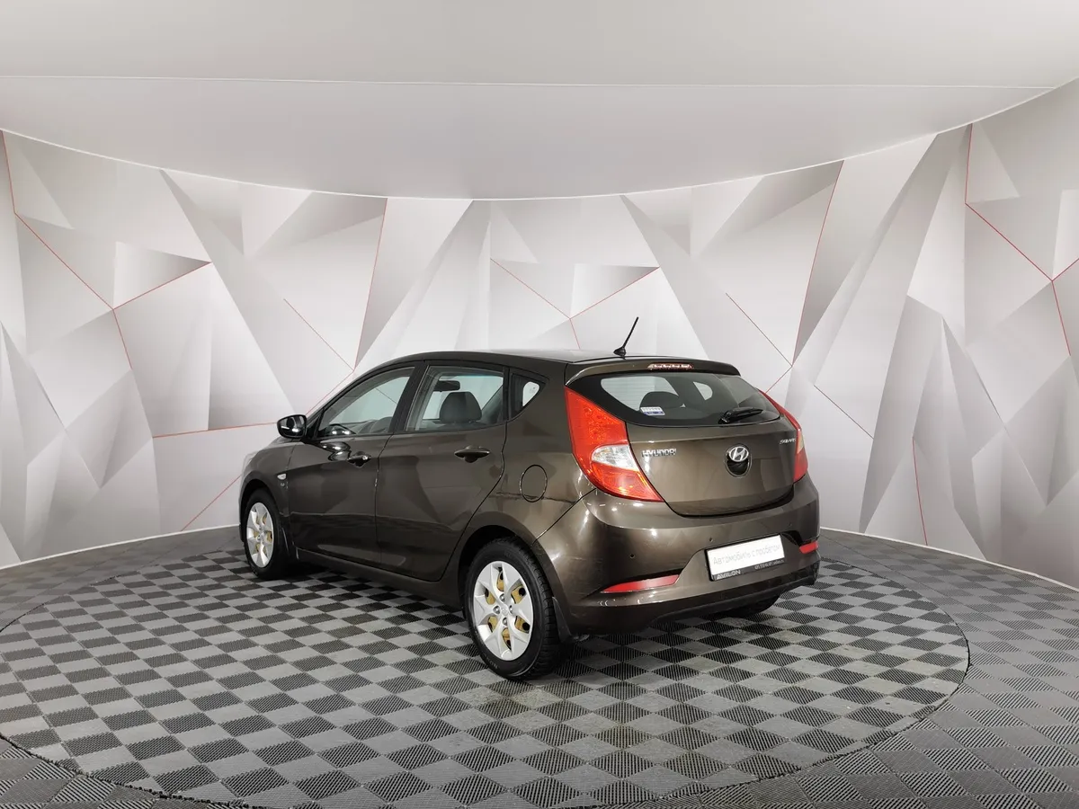 Hyundai Solaris 1.6 MT (123 л.с.) Comfort Коричневый в АВИЛОН. Слайд №4