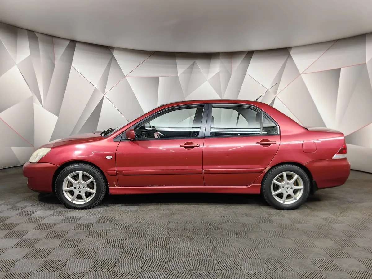 Mitsubishi Lancer 1.6 AT (98 л.с.) Красный в АВИЛОН. Слайд №5