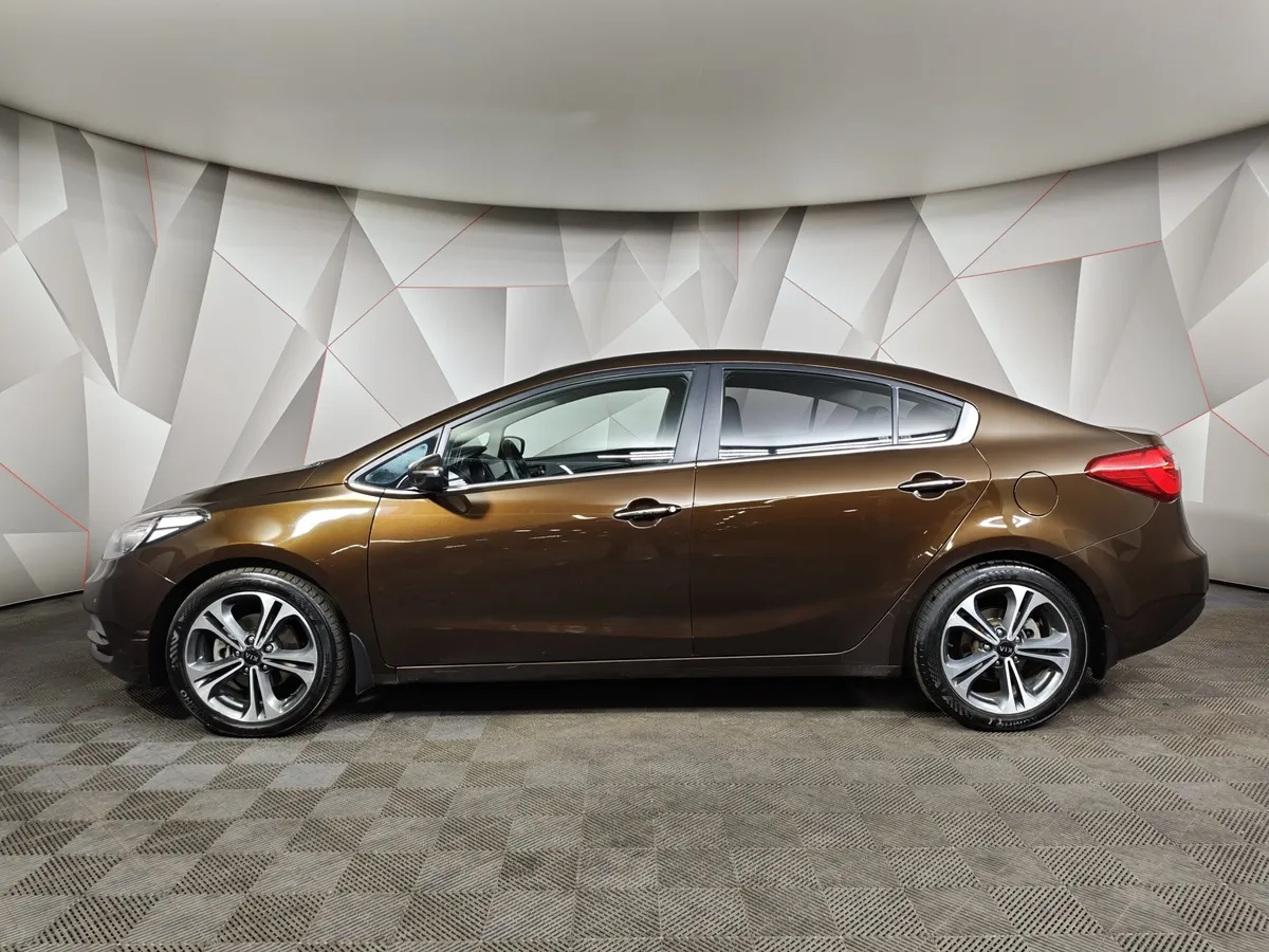 Kia Cerato 1.6 AT (130 л.с.) Коричневый в АВИЛОН. Слайд №5