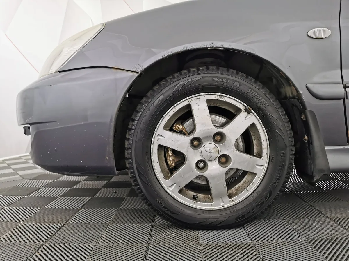 Mitsubishi Lancer 1.6 AT (98 л.с.) Серый в АВИЛОН. Слайд №9