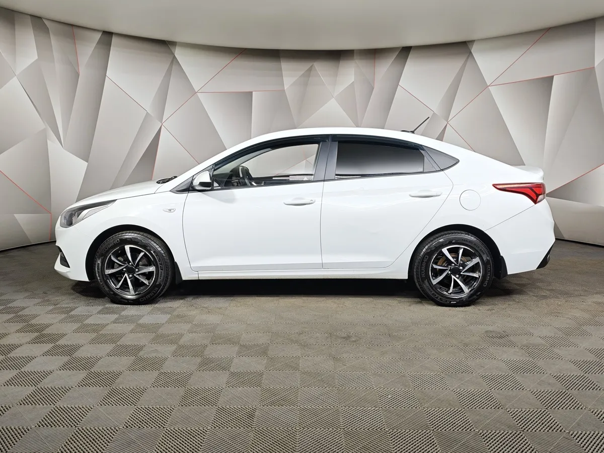 Hyundai Solaris 1.4 AT (107 л.с.) Active Белый в АВИЛОН. Слайд №5