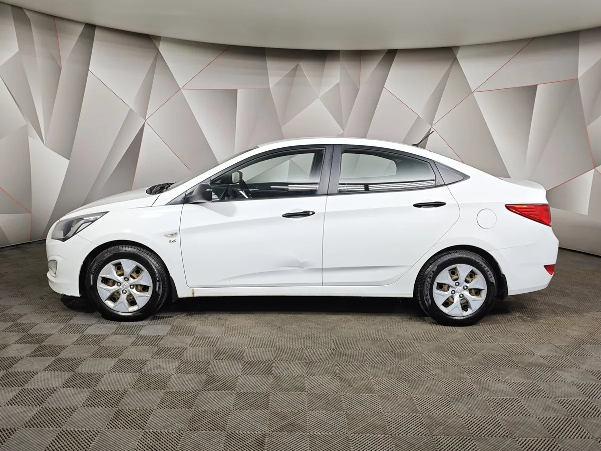 Hyundai Solaris 1.6 MT (123 л.с.) Comfort Белый в АВИЛОН. Слайд №5