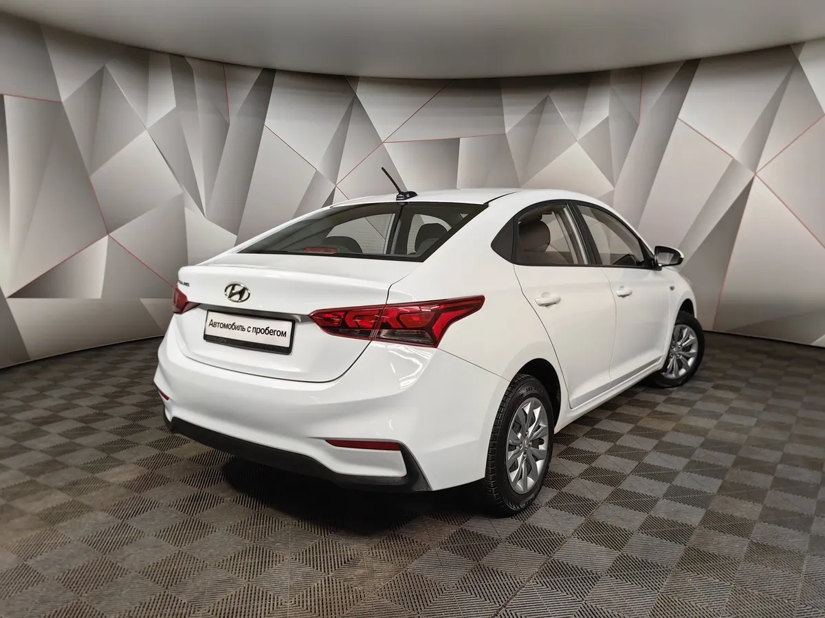 Hyundai Solaris 1.4 MT (107 л.с.) Active Белый в АВИЛОН. Слайд №2