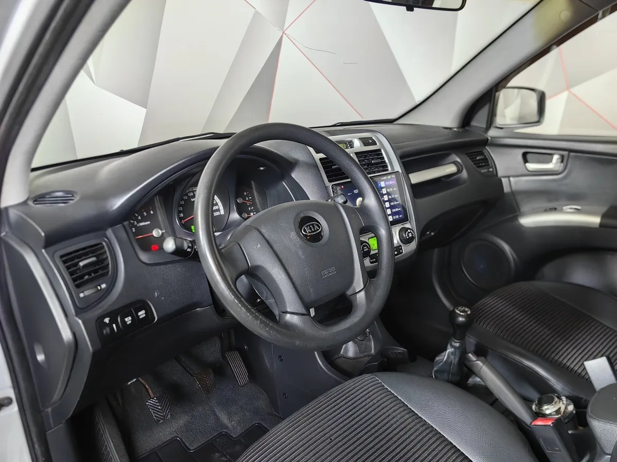 Kia Sportage 2.0 CRDi AT 4WD (112 л.с.) Серебристый в АВИЛОН. Слайд №18