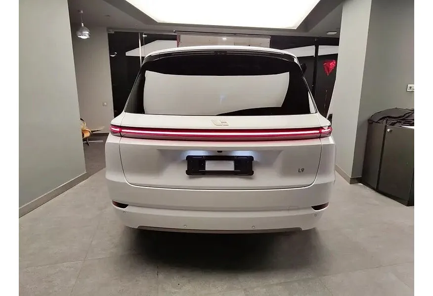 Li Auto L9 1.5 AT 4WD (449 л.с.) Ultra Белый в АВИЛОН. Слайд №4