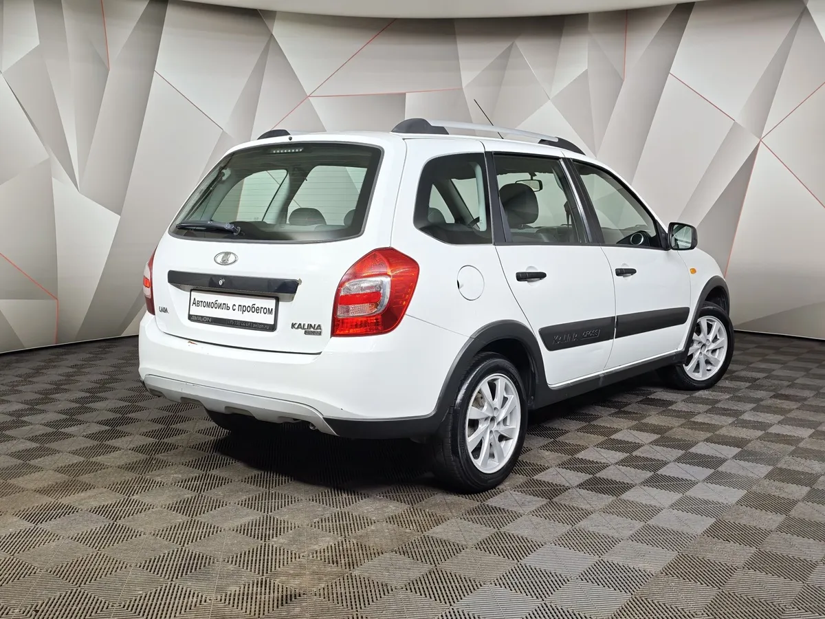 ВАЗ (Lada) Kalina 1.6 MT (87 л.с.) Белый в АВИЛОН. Слайд №2