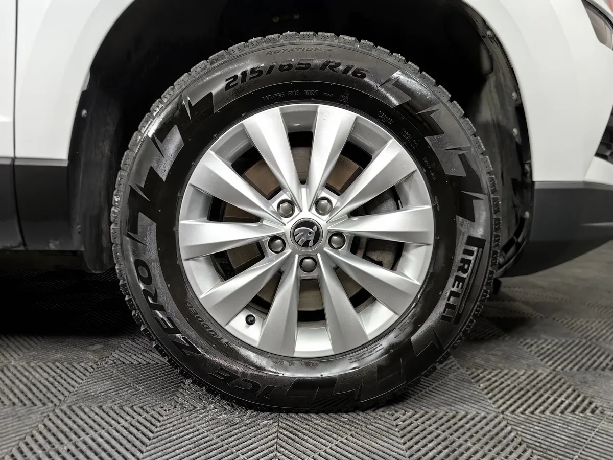 Skoda Karoq 1.4 AMT AWD (150 л.с.) Ambition Белый в АВИЛОН. Слайд №9