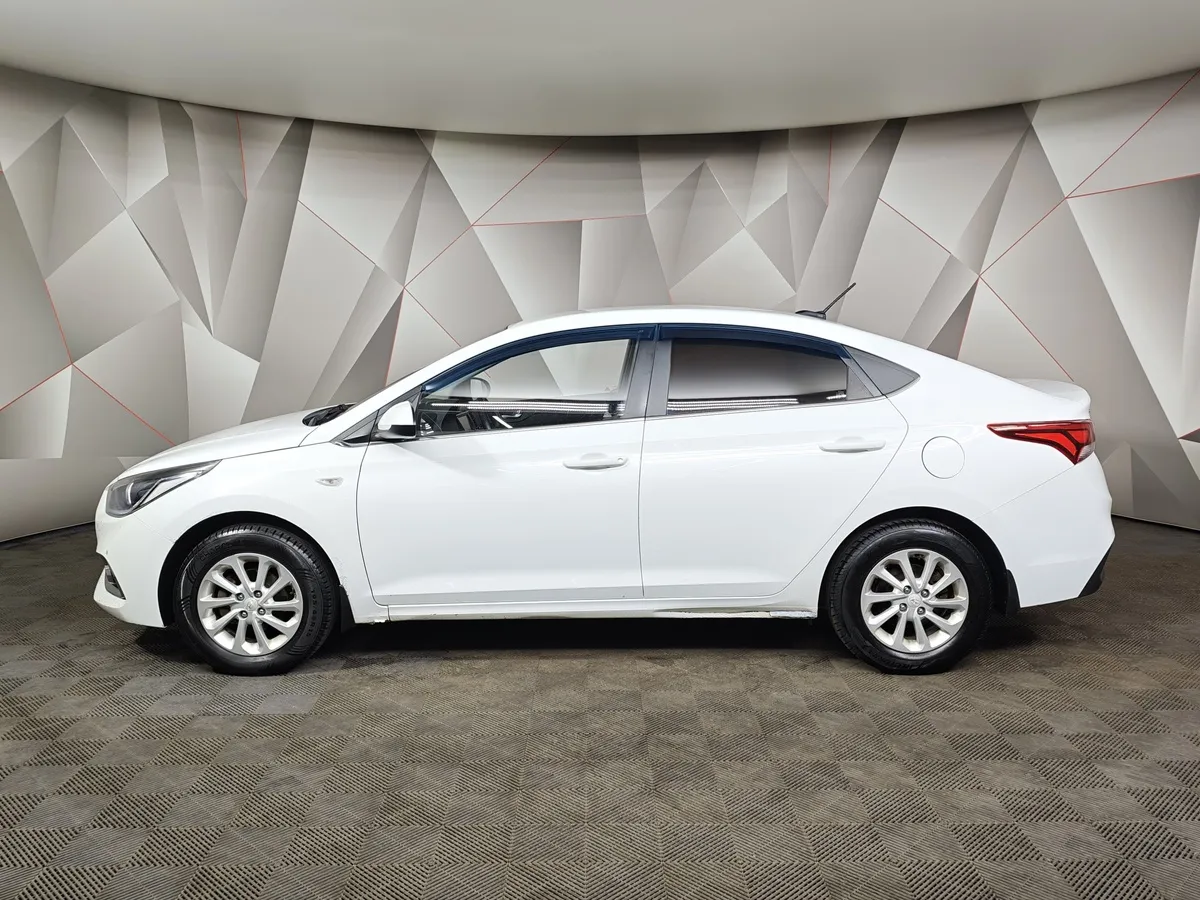 Hyundai Solaris 1.6 MT (123 л.с.) Elegance Белый в АВИЛОН. Слайд №5