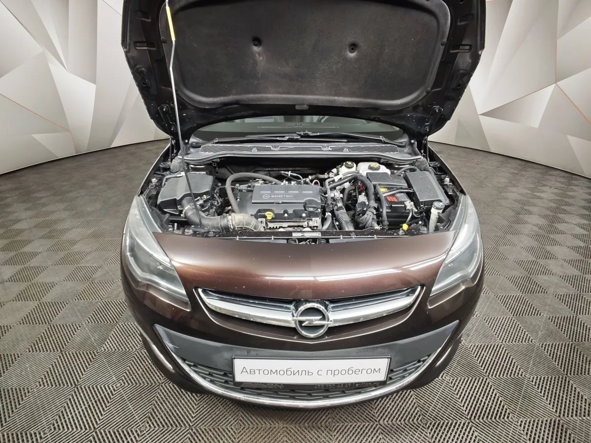 Opel Astra 1.4 Turbo AT (140 л.с.) Коричневый в АВИЛОН. Слайд №11
